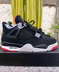 Air Jordan 4 — Black/Cement "Bred"