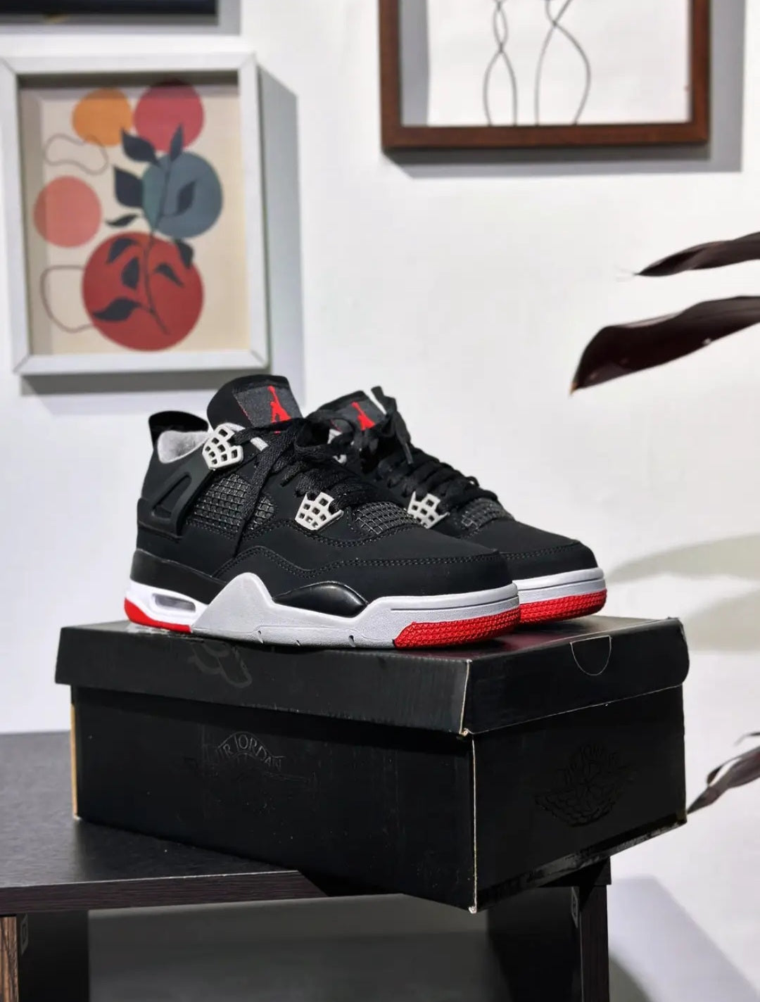Air Jordan 4 — Black/Cement "Bred"