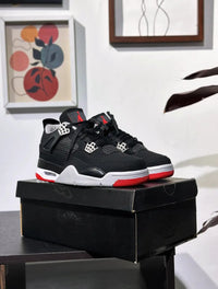 Air Jordan 4 — Black/Cement "Bred"